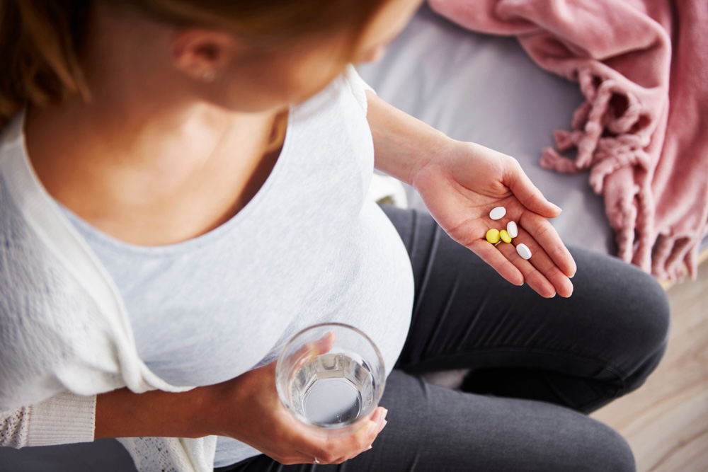 A young pregnant woman taking trazodone
