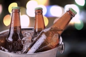 Bottles of cold beer in an ice bucket