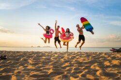 Young people enjoying summer at the beach