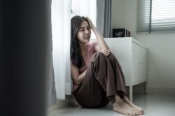 Woman who relapsed crying alone inside her room