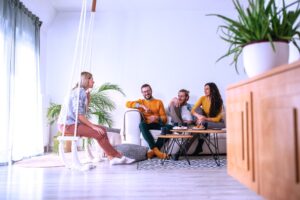 A group of men and women in recovery living in a sober
