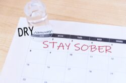 Calendar with sober written on it for the new year